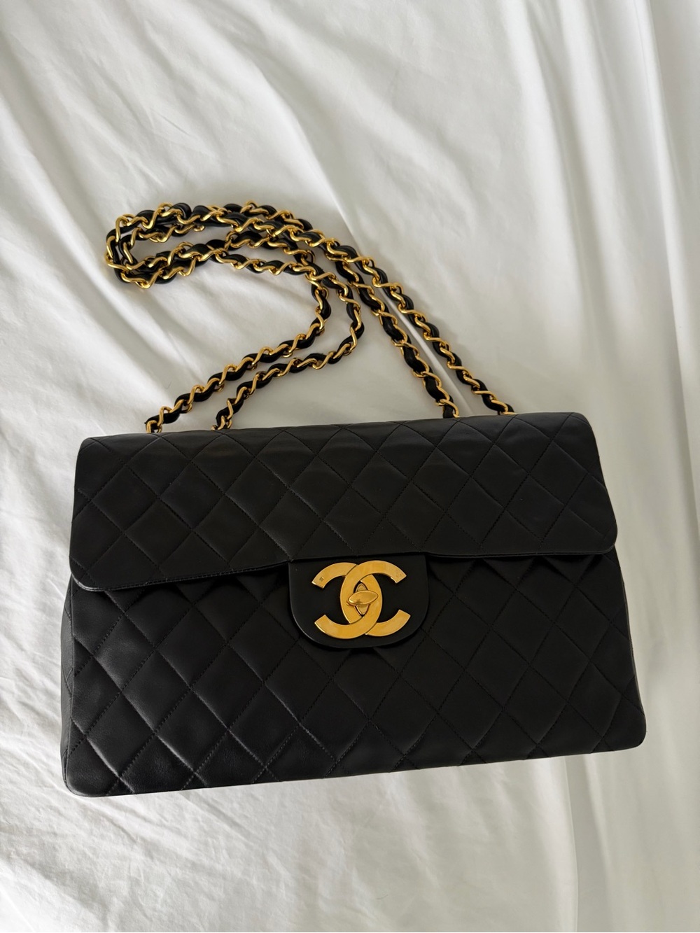 CHANEL Black Quilted Shoulder Bag with Gold Hardware